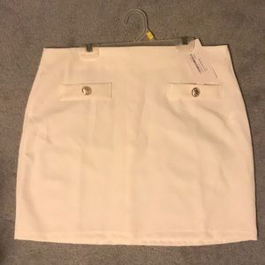White mini skirt with the tags still on!